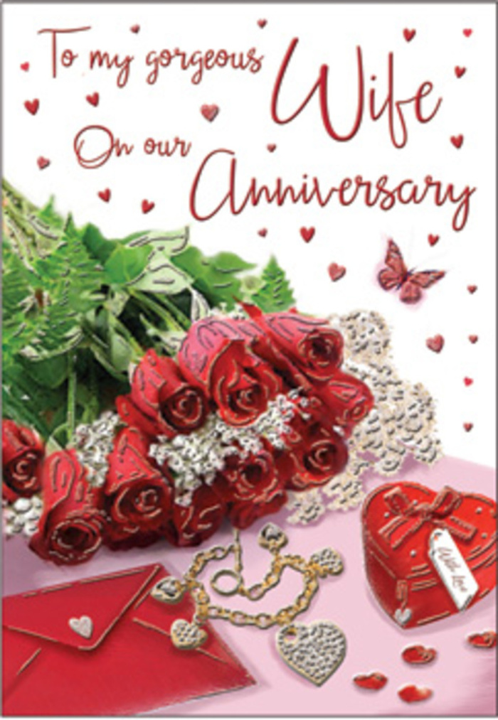 The scene on this anniversary card is composed like a romantic vignette from a West Ham home, where someone has taken time to arrange every item with care. At its heart lies a tight grouping of classic red roses, their petals rich and velvety, each bloom unfurling in generous, layered spirals that seem almost three-dimensional. Surrounding them is a halo of fresh greenery, with glossy leaves that accentuate the crimson tones and add a sense of natural fullness, as if the bouquet had just arrived from a local florist near the high street. Resting nearby is an envelope in soft, neutral tones, its paper subtly textured and gently illuminated by the daylight, hinting at a personal handwritten anniversary message. A vivid red heart-shaped box anchors one corner, its edges smooth and refined, suggesting it contains a special piece of jewellery or a keepsake meant to be cherished for years. A delicate chain, likely in a warm metallic hue, winds gracefully across the composition, its tiny intertwined hearts mirroring the emotional ties between long-time partners. Scattered around are small heart decorations and sparkling embellishments, catching the light at different angles and adding a sense of festivity without overwhelming the scene. A single butterfly motif appears poised between stillness and flight, bringing an airy, hopeful element to the arrangement. The palette of passionate reds, subtle golds, and soft creams is wrapped in gentle, diffused lighting that creates a calm, intimate mood. Overall, this design beautifully conveys the quiet joy and deep affection at the heart of a West Ham anniversary celebration.