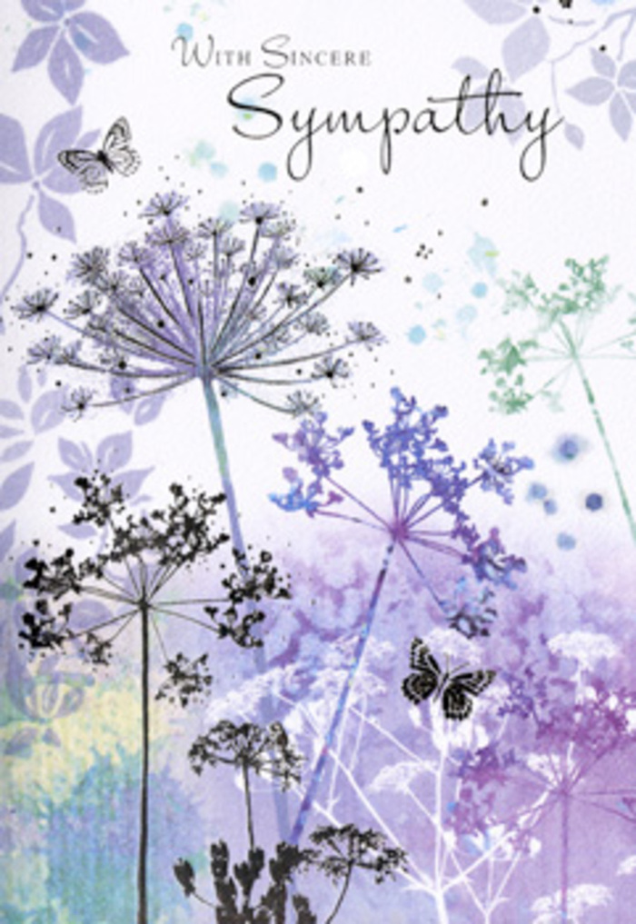 There is a quiet, reflective beauty in this sympathy card's design, one that echoes the stillness found in the green spaces scattered around West Ham. From the base of the illustration, fine, arching stems emerge, supporting intricate umbels of tiny flowers that spread out like soft fireworks frozen in time. These umbelliferous heads are shaded in gentle layers of violet, lavender and powder blue, with touches of cool, silvery green that soften their outlines and lend them an ethereal quality. The petals appear almost translucent at the tips, as though light is passing through them, creating a sense of airiness and subtle motion, like wildflowers swaying on the breeze near Memorial Recreation Ground. The background is a softly blurred wash, where muted purples and pale blues blend seamlessly with faint green tones. This painterly haze suggests a distant meadow or a sky just before dusk, providing a comforting backdrop that never competes with the delicate line work of the flowers. Scattered lightly throughout are a couple of butterflies, hovering just above the stems. Their wings are faintly drawn, semi-transparent and gently curved, symbolising hope, continuity and the quiet presence of loved ones held in memory. The entire composition is carefully spaced, giving each element breathing room, so the eye can move easily from stem to blossom to butterfly. Above or alongside this serene floral scene sits a short, heartfelt message of sympathy in refined script, dignified and sincere. For those in West Ham choosing a condolence card to accompany funeral flowers or a sympathy bouquet, this design offers a visual pause: a moment to breathe, reflect and feel supported, much like the considered, gentle arrangements we prepare for local families.